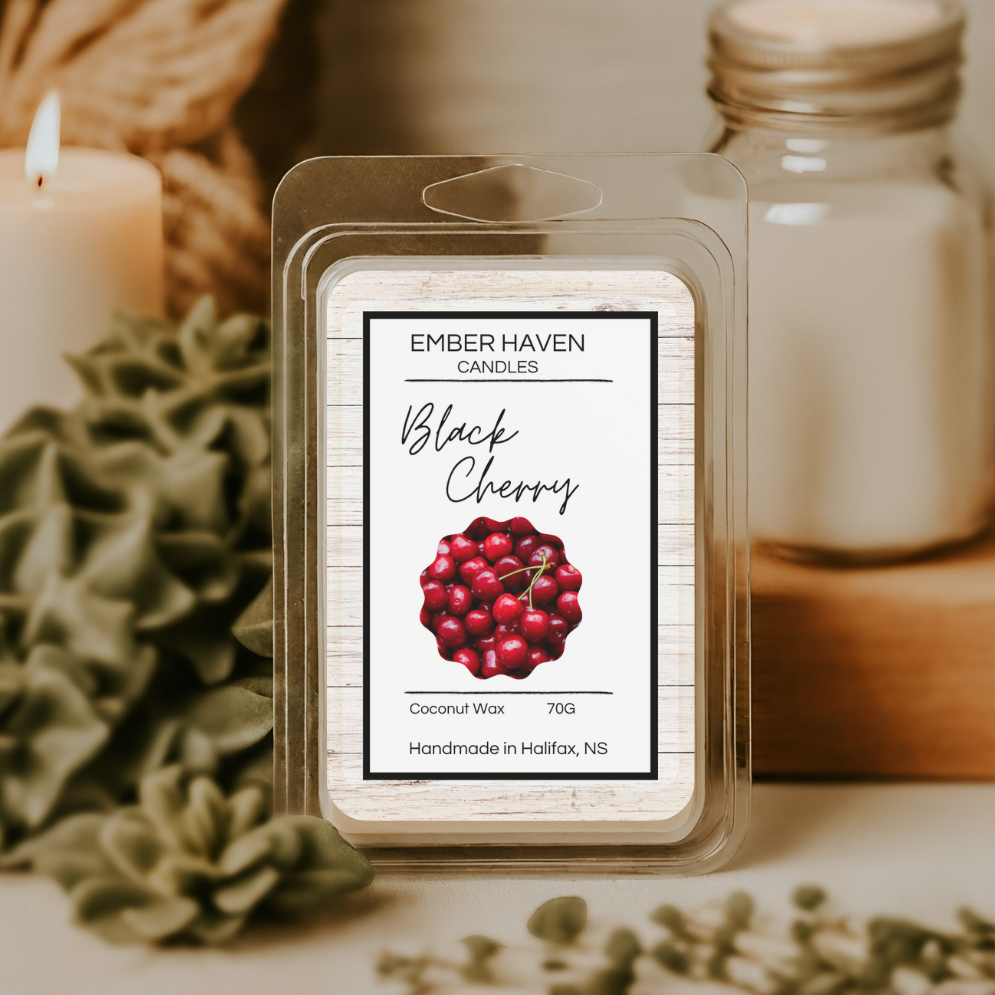 Ember Haven Candles Black Cherry wax melt packaging with a candle and jar in the background