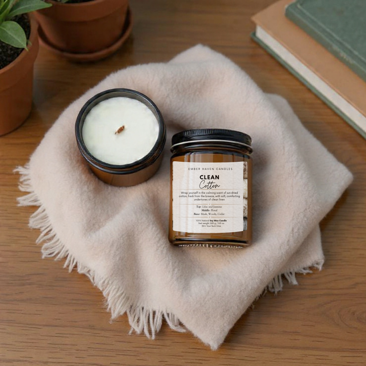 Candle and jar labeled 'Clean' on a wooden surface with a blanket and plants in the background