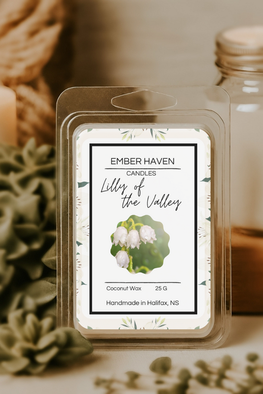 Ember Haven Candles wax melt package with a candle and jar in the background