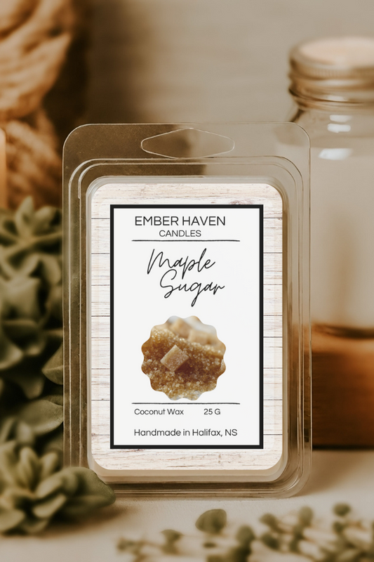 Ember Haven Candles Maple Sugar wax melt packaging with a candle and jar in the background