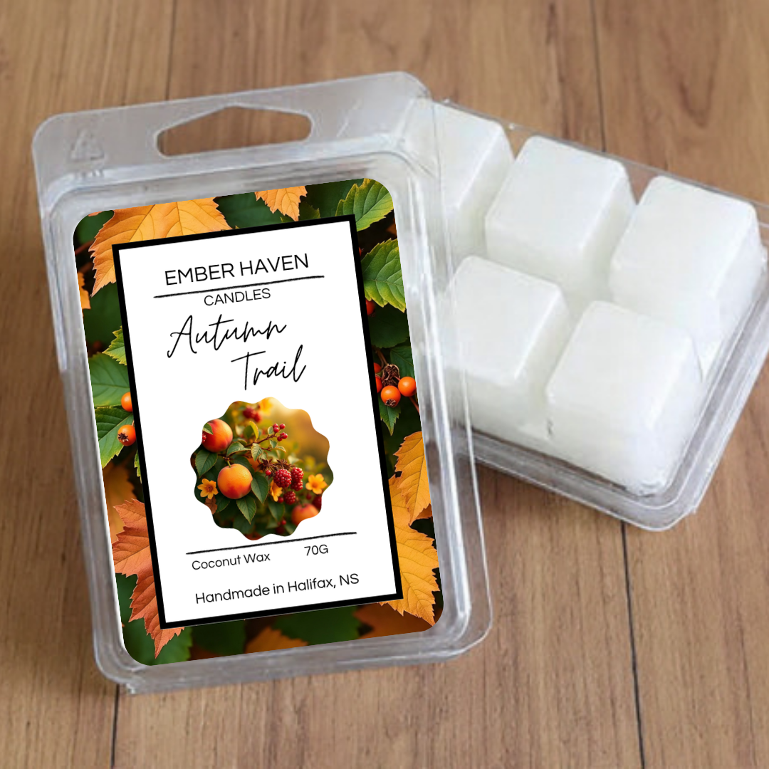 Autumn Trail wax melts by Ember Haven Candles in a 70g package, featuring warm fall-inspired scents and decorative wax pieces.