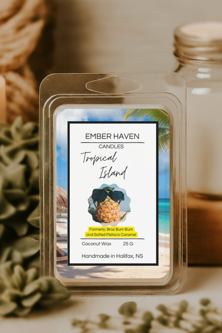 Ember Haven Candles Tropical Island wax melt packaging with a candle and jar in the background