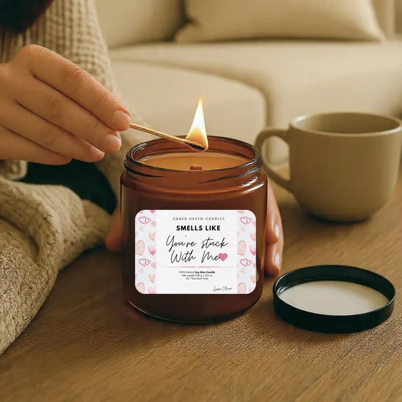 Custom quote candle by Ember Haven Candles with a decorative label and warm, inviting wax in a glass jar.